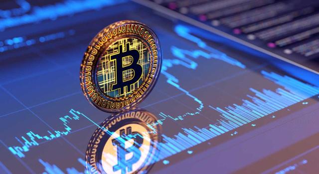Del bitcoin a las finanzas descentralizadas (DeFi): evolución y auge de la criptoeconomía Del bitcoin a las finanzas descentralizadas (DeFi): cómo ha evolucionado la criptoeconomía. Imagen de el signo de Bitcoin sobre un fondo del gráfico de negocios